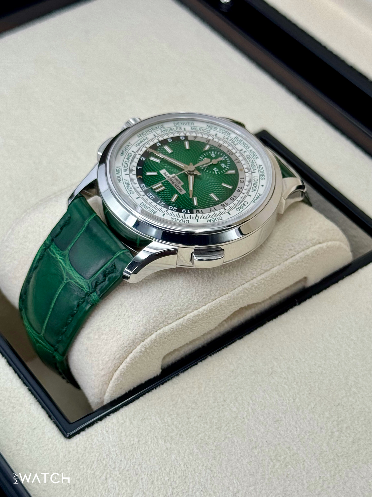 Patek Philippe 5930P World Time Flyback Chronograph Platinum Green Dial – box and papers